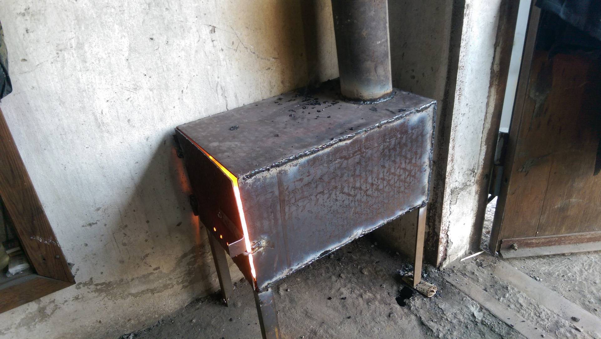 Как сделать печь для гаража на дровах длительного горения своими руками