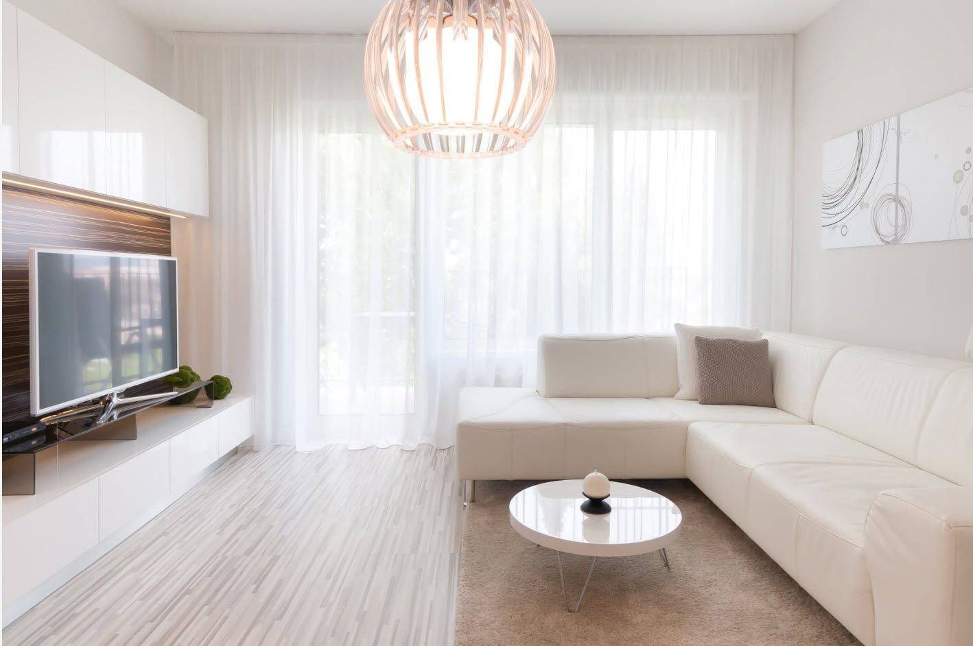 Интерьер гостиной в стиле минимализм — фото идей по отделке и меблировке