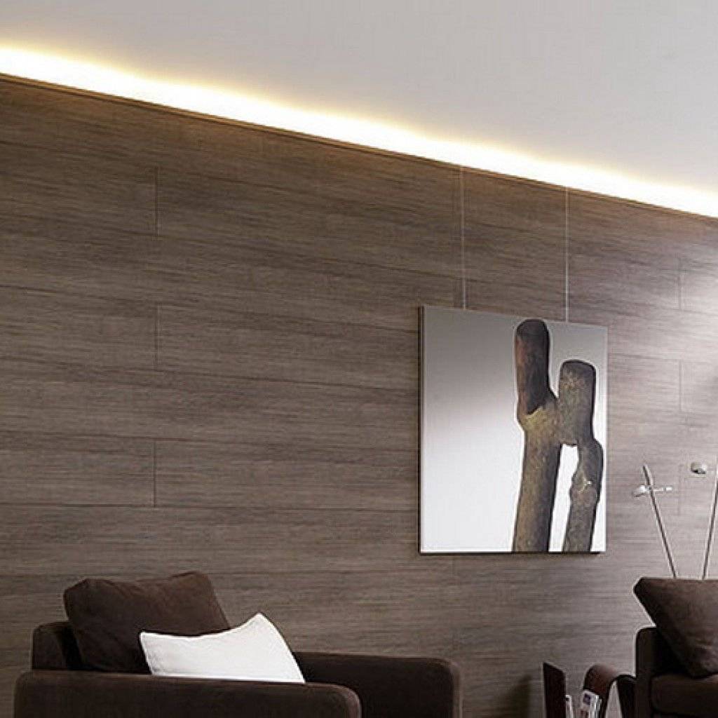 Ламинат на стене в интерьере: внутренняя отделка стен в гостиной, коридоре, прихожей и кухне, облицовка за телевизором в деревянном доме
 - 55 фото